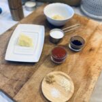 Ingredients for Quick Keto Chicken Wings on a wooden chopping board