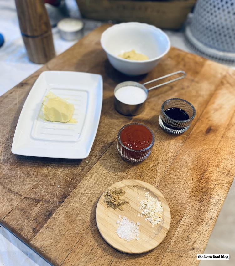 Ingredients for Quick Keto Chicken Wings on a wooden chopping board