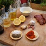 Ingredients for Grilled Flank steak on wooden chopping board