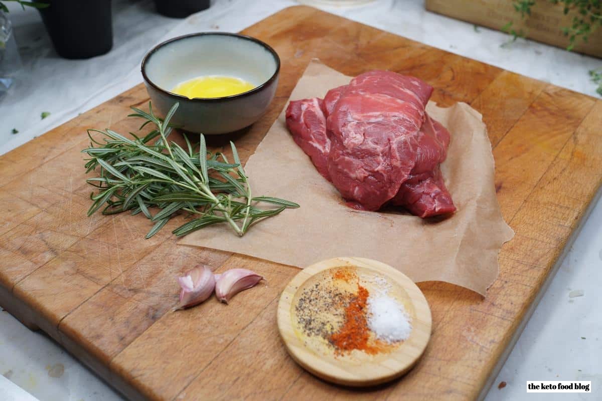 ingredients for a keto beef recipes presented on a chopping board