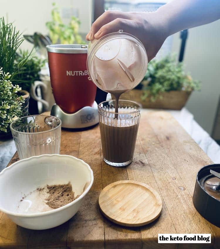 Pouring the Chocolate and Macadamia Nut Smoothie into a glass from a nutribullet