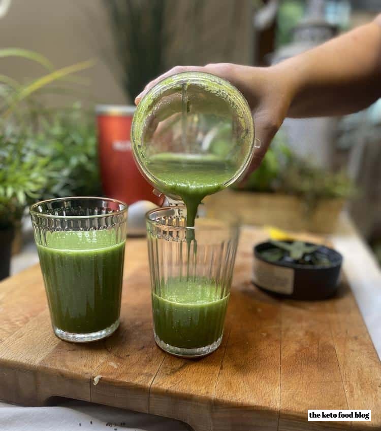 Pouring a Super Food Green Smoothie from a nutri bullet