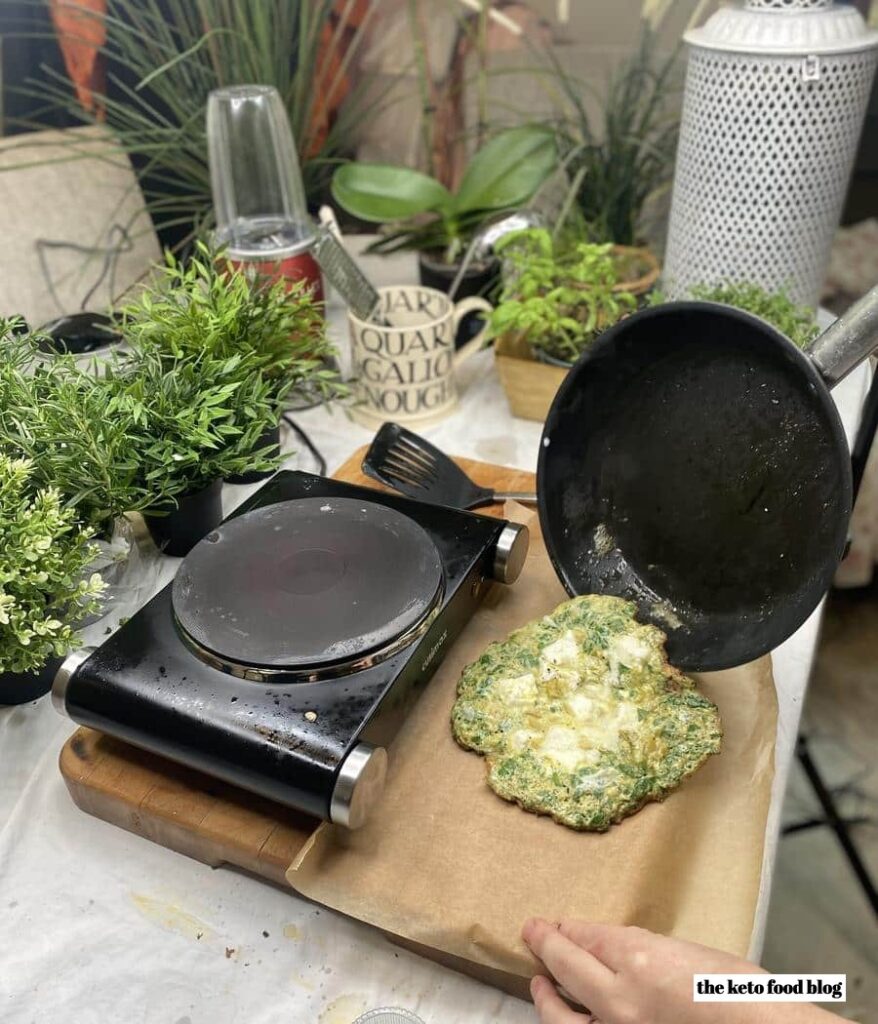 Omelet Wraps on greaseproof paper waiting to be rolled