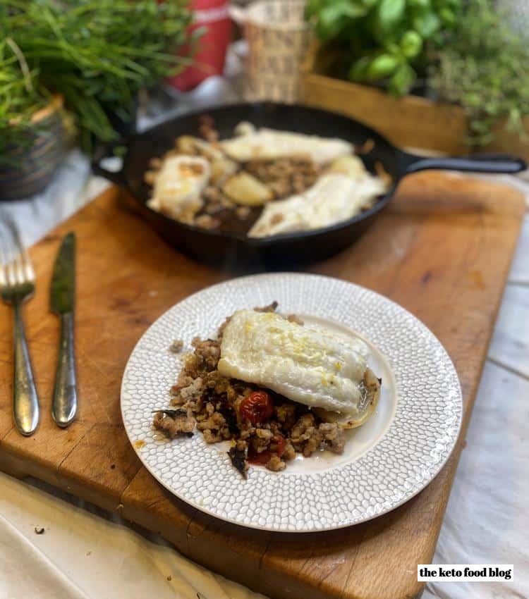 Haddock and sausage on a plate