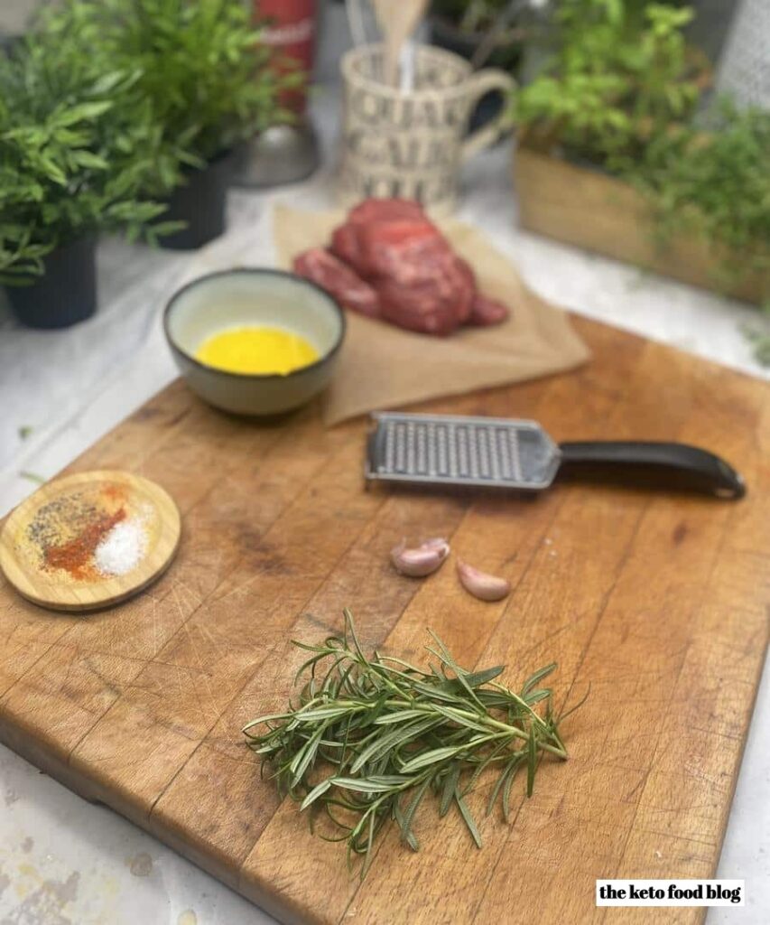 Rosemary, steak, garlic, ghee and seasoning