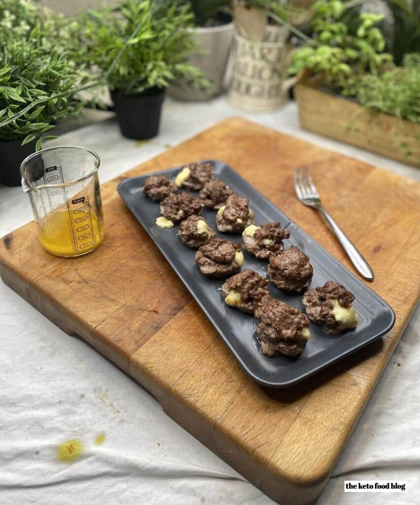 Keto Butter Burgers Fat Bomb on wooden chopping board