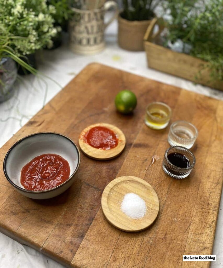 Ingredients for the asian sauce on a wooden chopping board